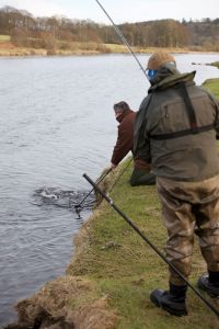 FishPal's CEO Mark Cockburn netting a customers fish